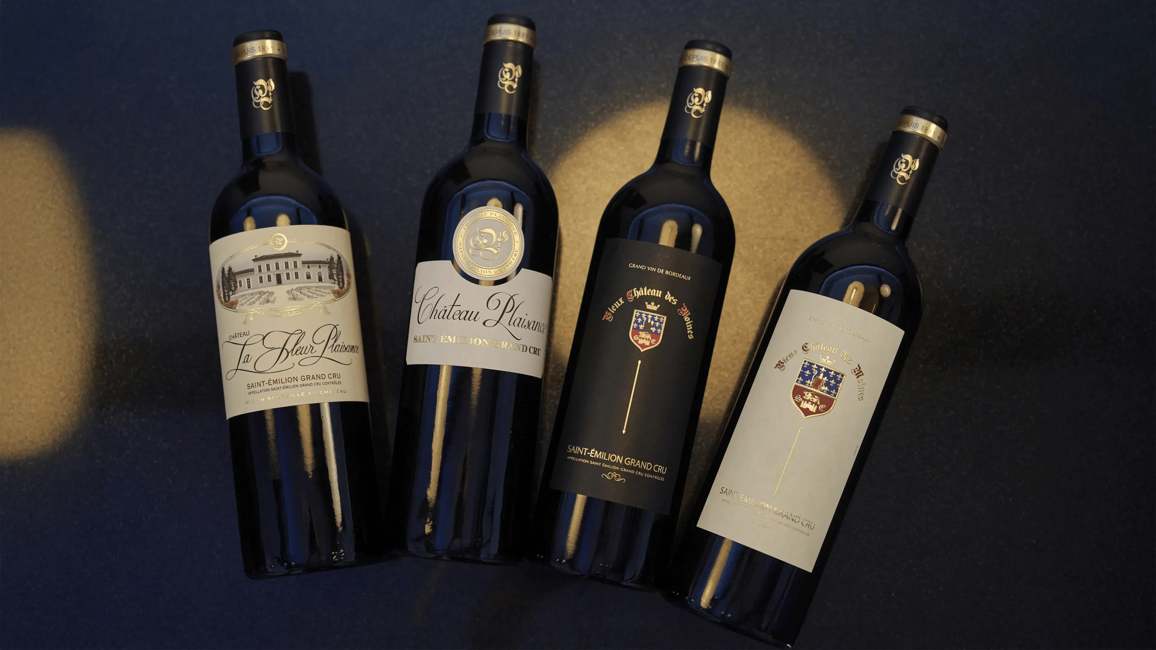 A photograph of the wines of Chateau Plaisance