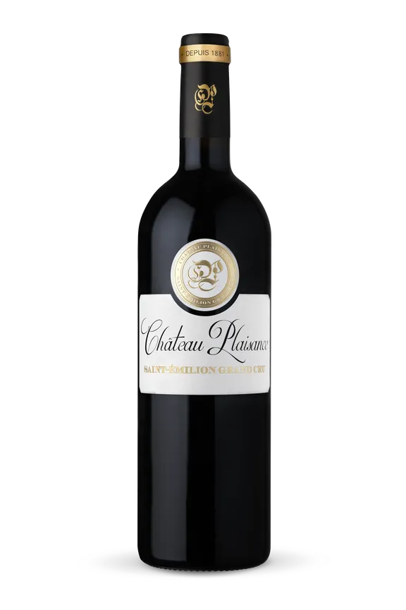 A photograph of a bottle of Château Plaisance award winning Saint-Émilion Grand Cru red wine.