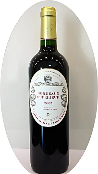 A bottle of Château Haut-Meynard 2005 Bordeaux Supérieur red wine with gold foil capsule against a neutral background.
