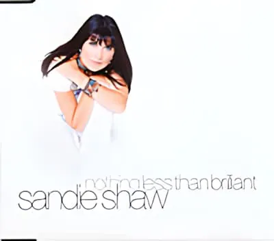 An album cover showing a contemporary portrait of Sandie Shaw in white, with her name and