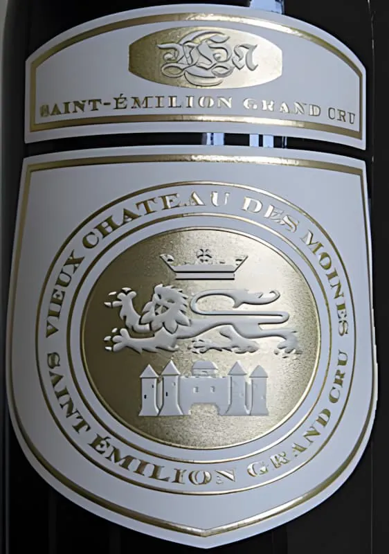 Close-up of Vieux Château des Moines wine label with château crest